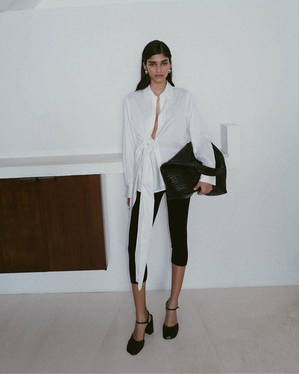 capri panatalón blusa blanca bolso negro