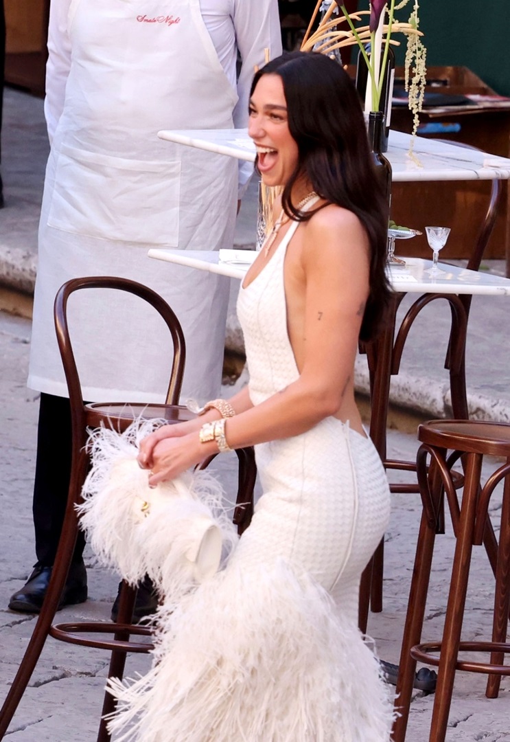 Dua Lipa and Callum Turner Can't Stop Smiling at Their Palermo Pre-Wedding Party—and He Couldn't Take His Eyes Off Her Behind